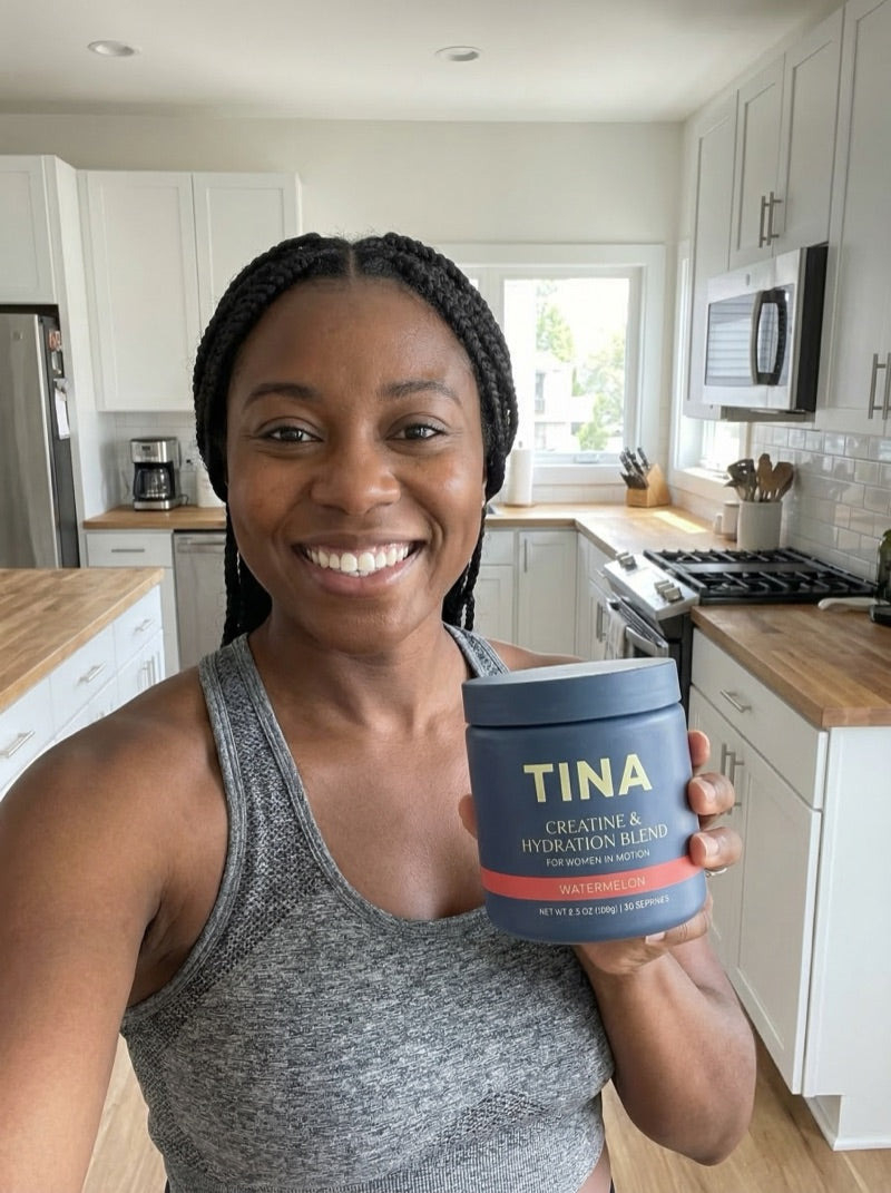 Keisha holding TINA creatine